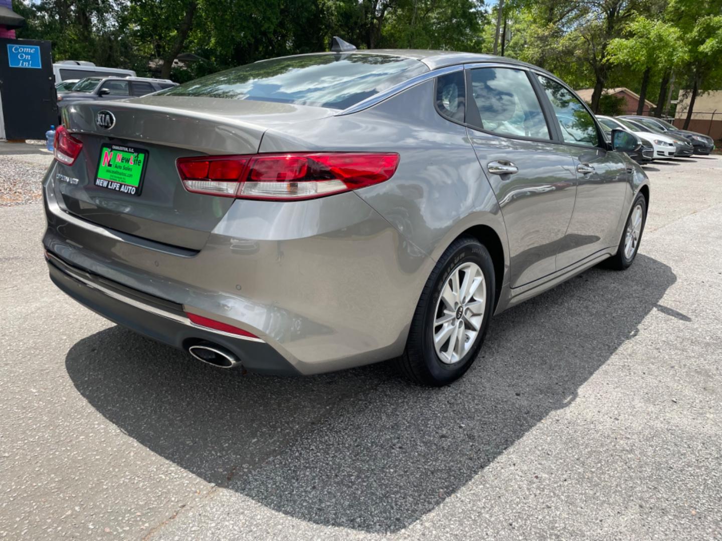 2018 GRAY KIA OPTIMA LX (5XXGT4L34JG) with an 2.4L engine, Automatic transmission, located at 5103 Dorchester Rd., Charleston, SC, 29418-5607, (843) 767-1122, 36.245171, -115.228050 - Roomy Interior with AUX/USB/Sat/Bluetooth, Power Windows, Power Locks, Power Mirrors, Backup Camera, Keyless Entry, Alloy Wheels. 118k miles Located at New Life Auto Sales! 2023 WINNER for Post & Courier's Charleston's Choice Pre-owned Car Dealer AND 2018-2024 Top 5 Finalist for Charleston City Pap - Photo#6